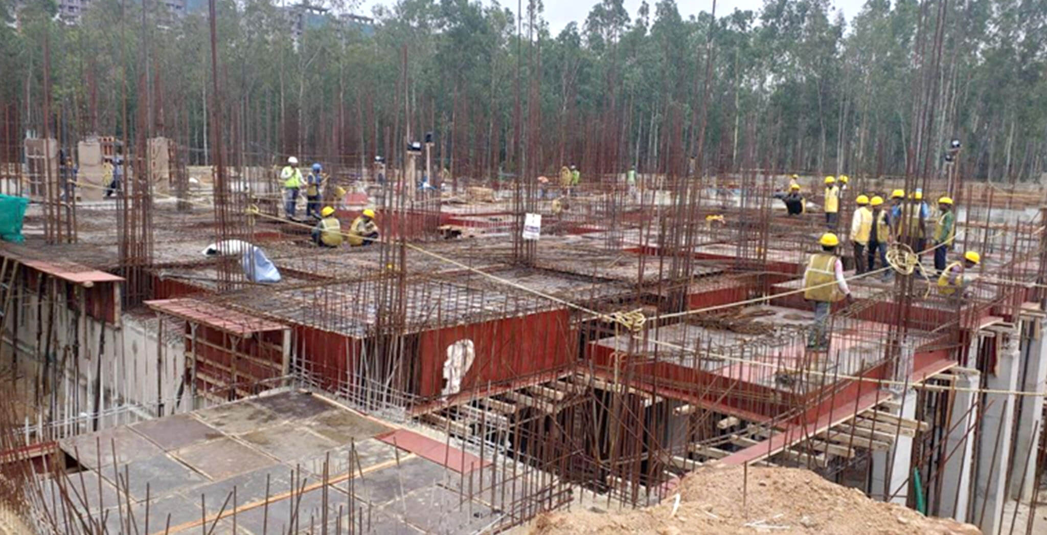 Aug 2019 - West side view: K Block Slab Shuttering and reinforcement work-in-progress • Rain water sump-5 Slab shuttering work-in-progress