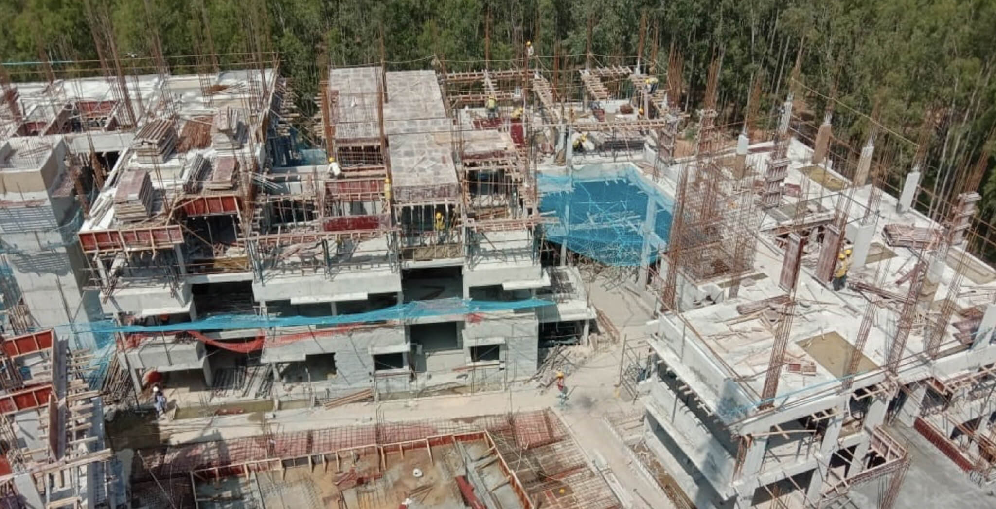 Nov 2019 - West side view: L Block—Third floor slab completed; M Block—Third floor shuttering work-in-progress; N Block—Second floor slab completed, columns work-in-progress
