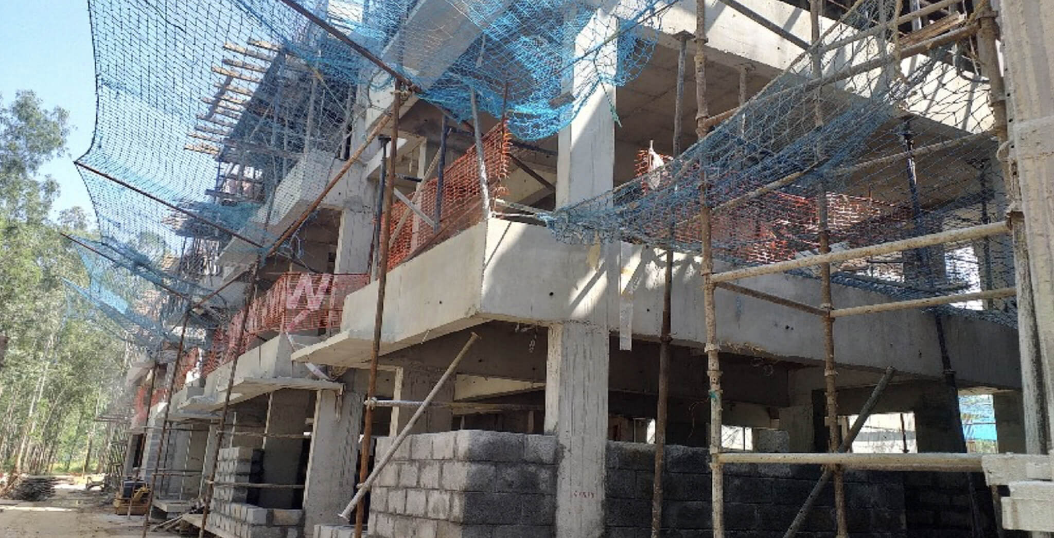 Nov 2019 - West side view: L & M Blocks—Ground floor block work-in-progress