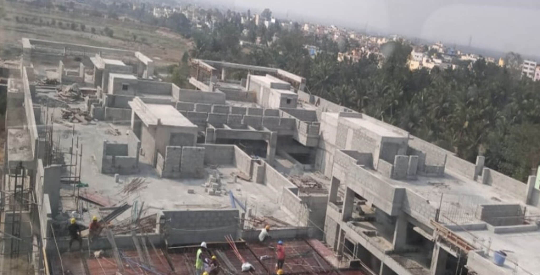 Feb 2020 - Tower-F—Above Terrace: LMR, SHR parapet wall work-in-progress.
