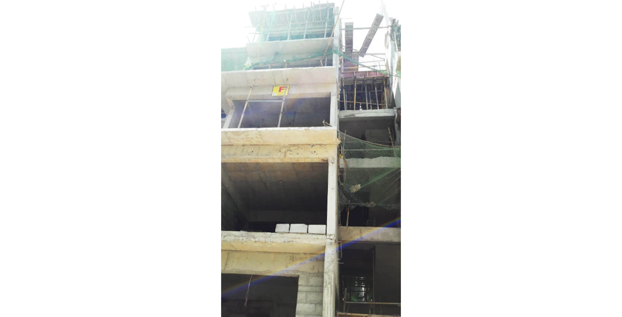 Mar 2020 - F Block: Ground floor internal wall plastering work; 2nd floor blockwork-in-progress.