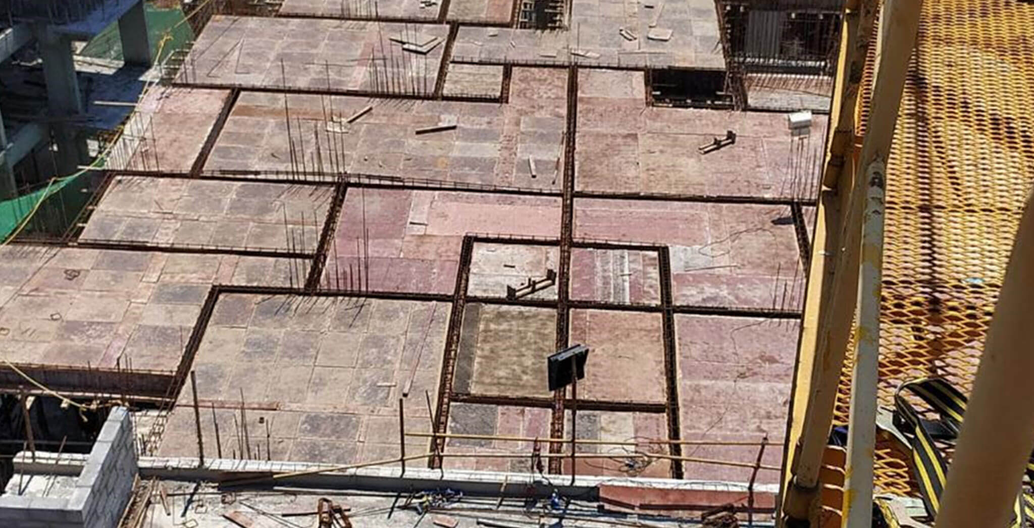 Mar 2020 - J Block: Terrace floor beam reinforcement work commenced.