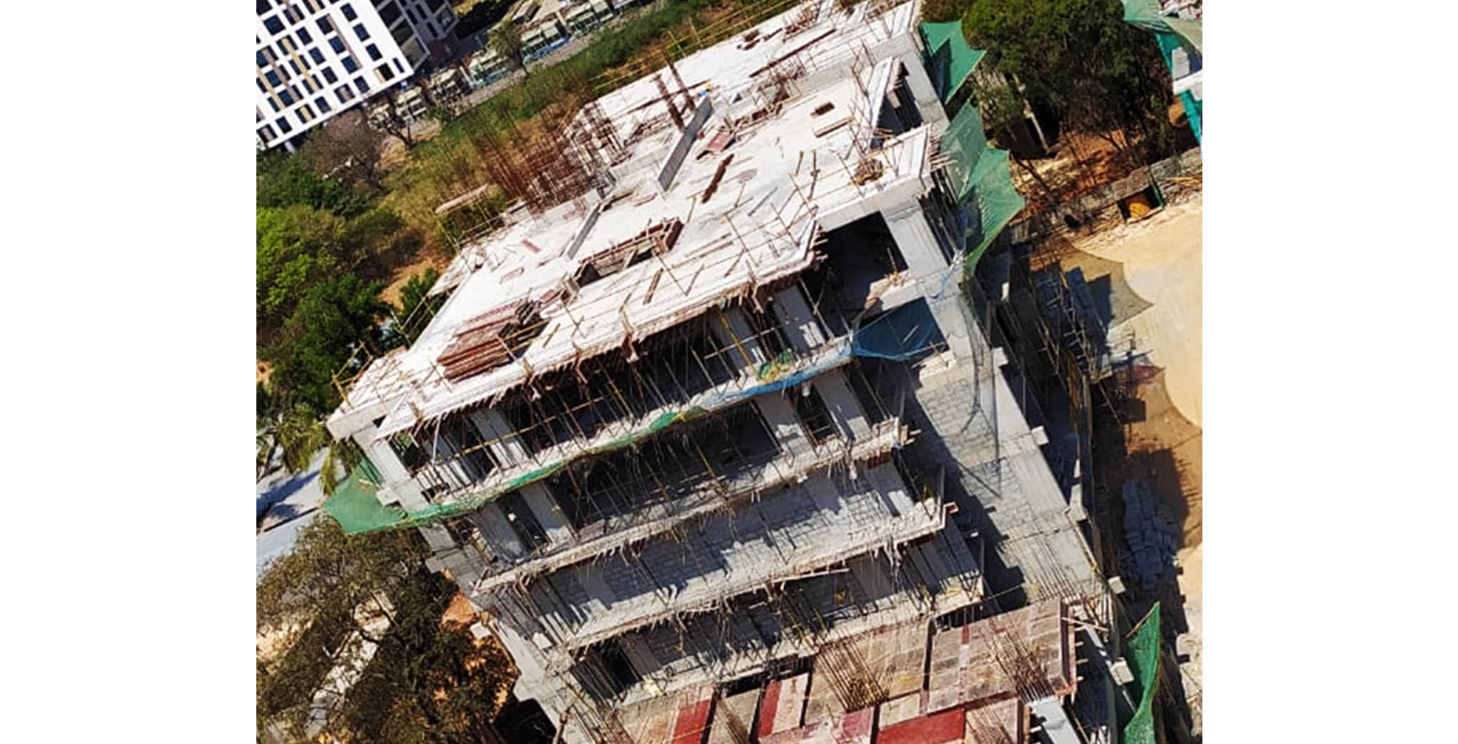 Mar 2020 - Q Block: Above Terrace floor column reinforcement work-in-progress; 1st floor internal wall plastering; 3rd floor blockwork in progress.