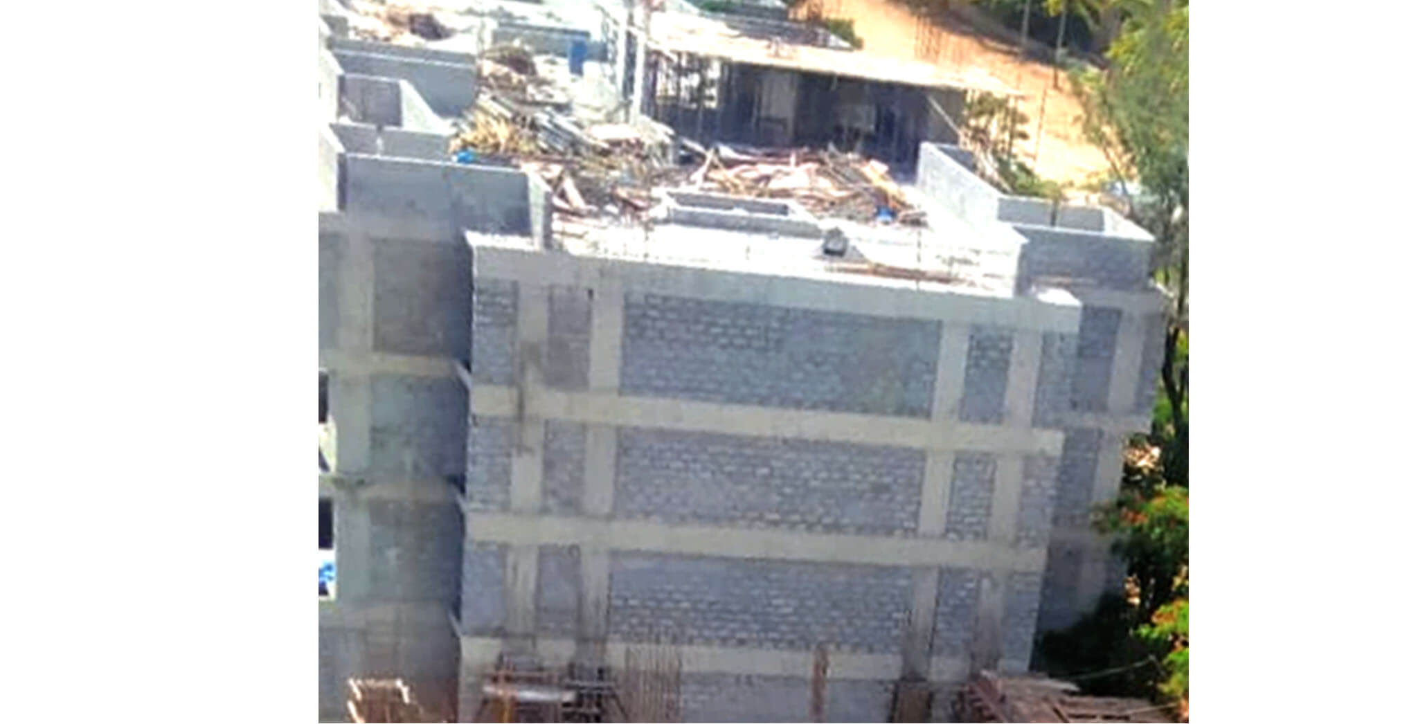 Jun 2020 - L Block: Above terrace parapet wall block-work and SHR roof slab shuttering work-in-progress; Block work completed up to 4th floor.