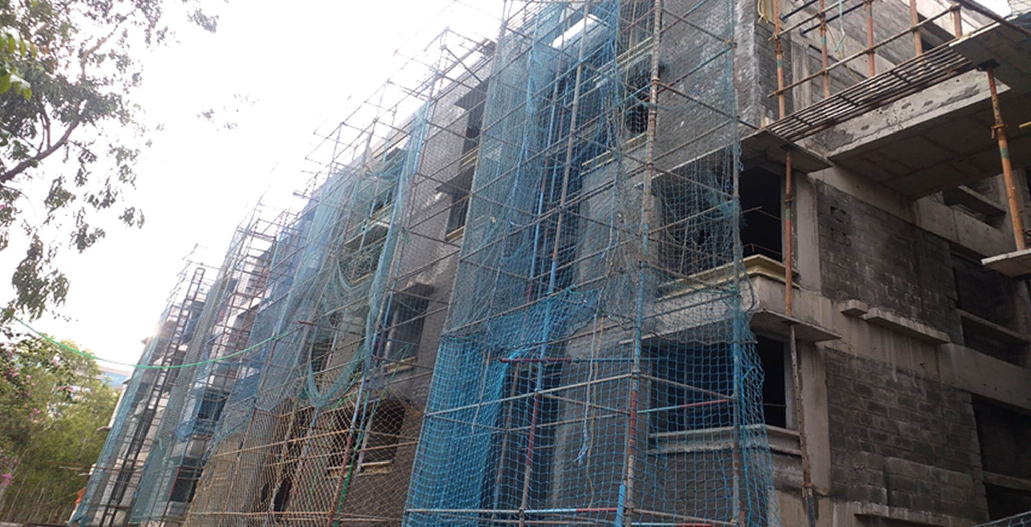 Jul 2020 - South side view: K Block–internal flat plastering completed, corridor plastering work-in-progress; External plastering work-in-progress.