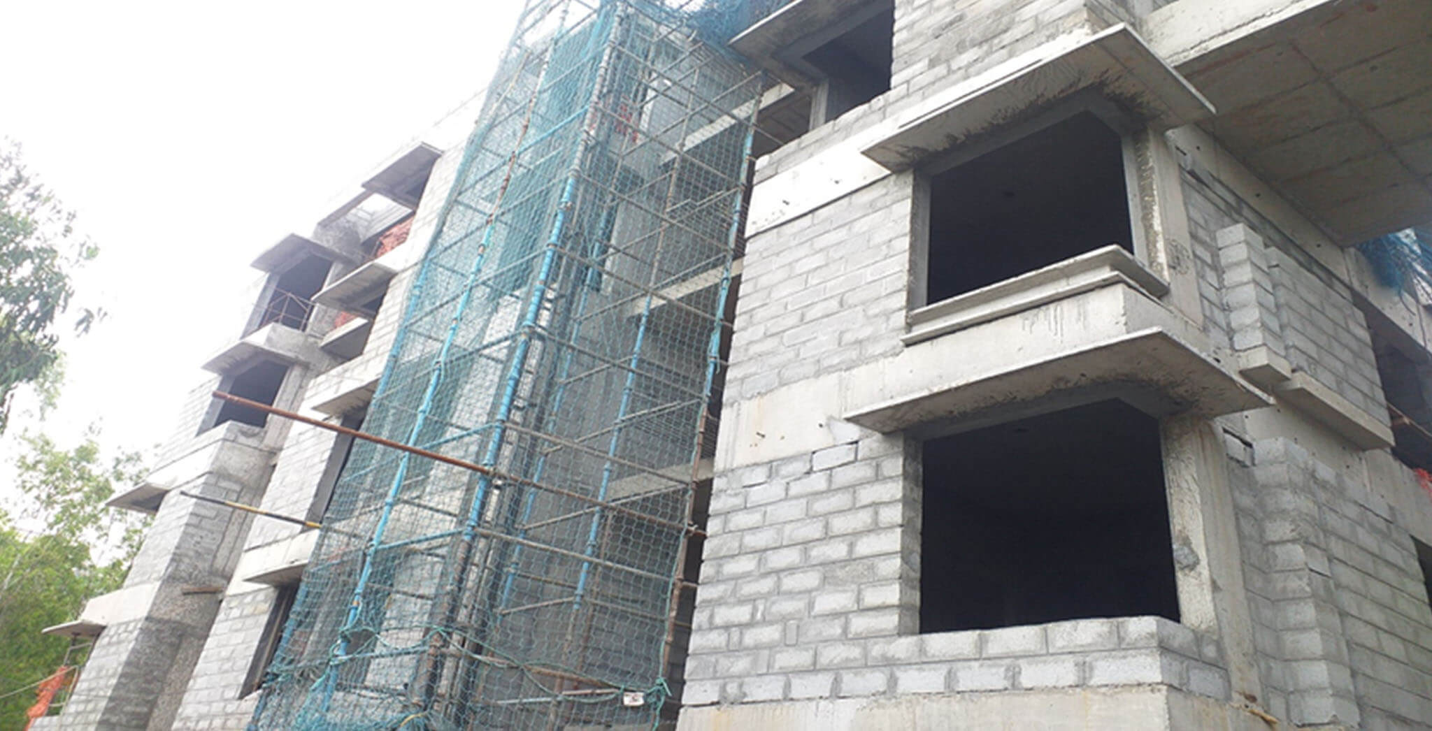 Jul 2020 - West side view: L Block–Blockwork completed, internal plastering work at 4th floor in progress.