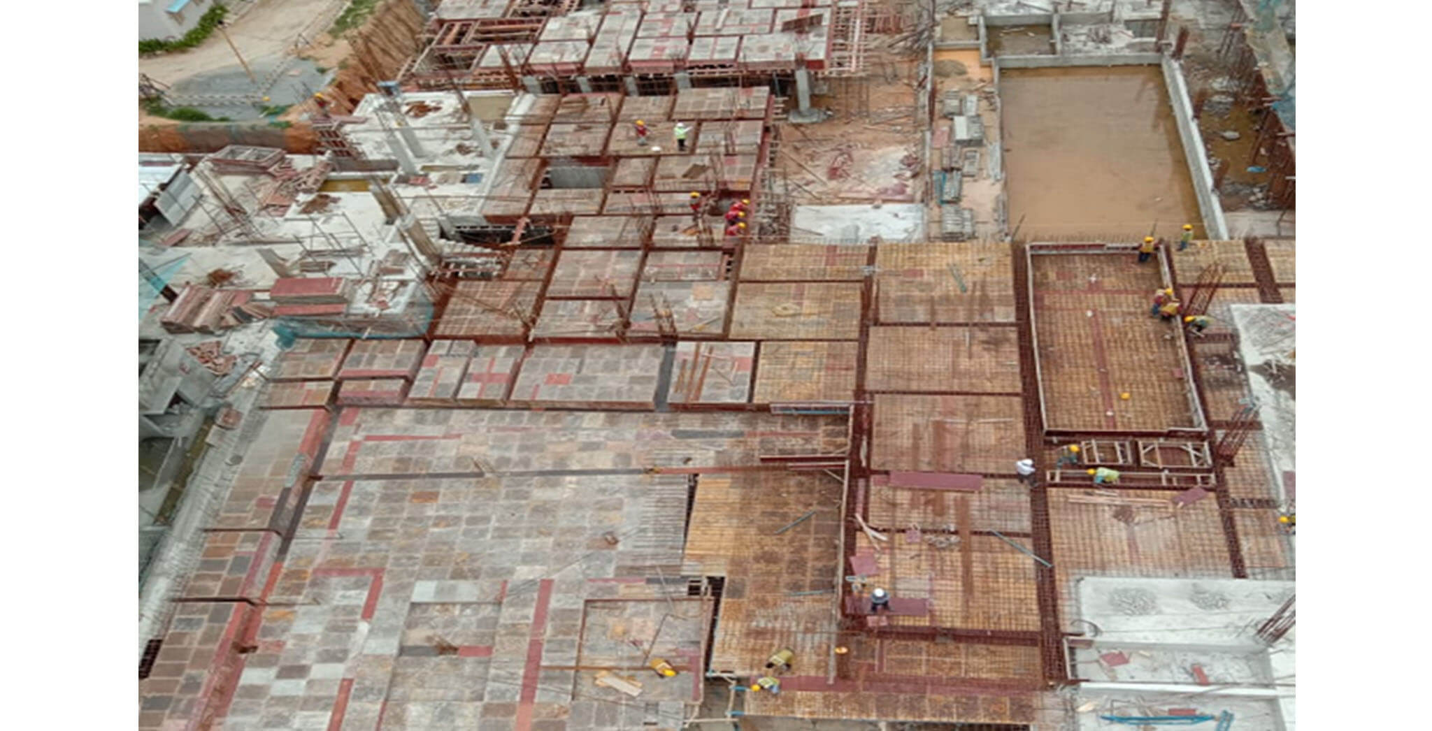 Jul 2020 - West side view: S Block—Podium shuttering and rebar work-in-progress.