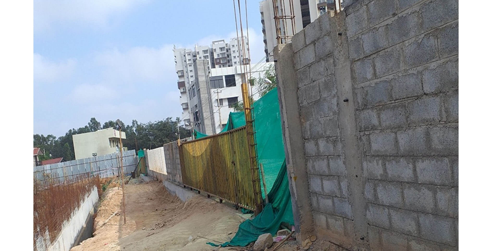 Jul 2020 - Front compound wall: Gate erection for Entry and exit completed.