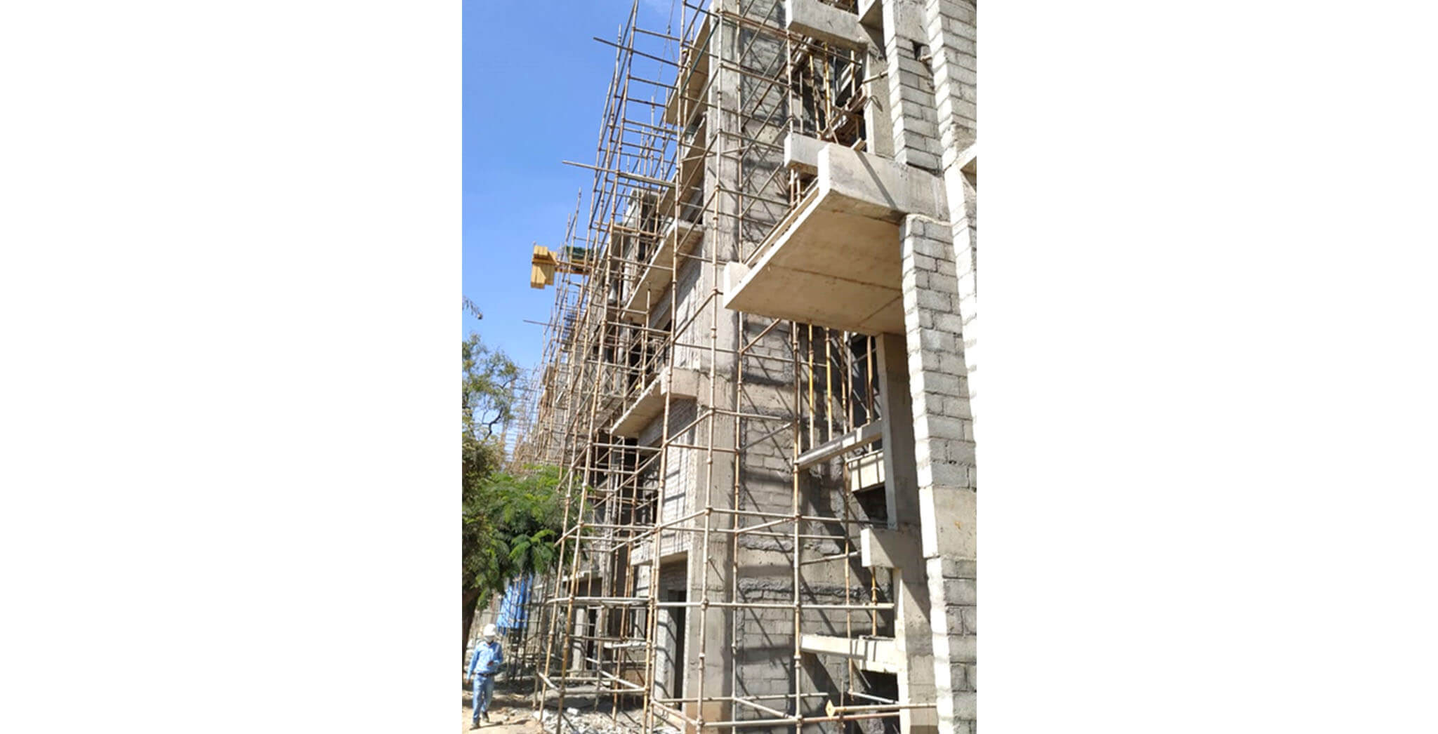 Dec 2020 - J Block: South elevation external plastering work-in-progress.
