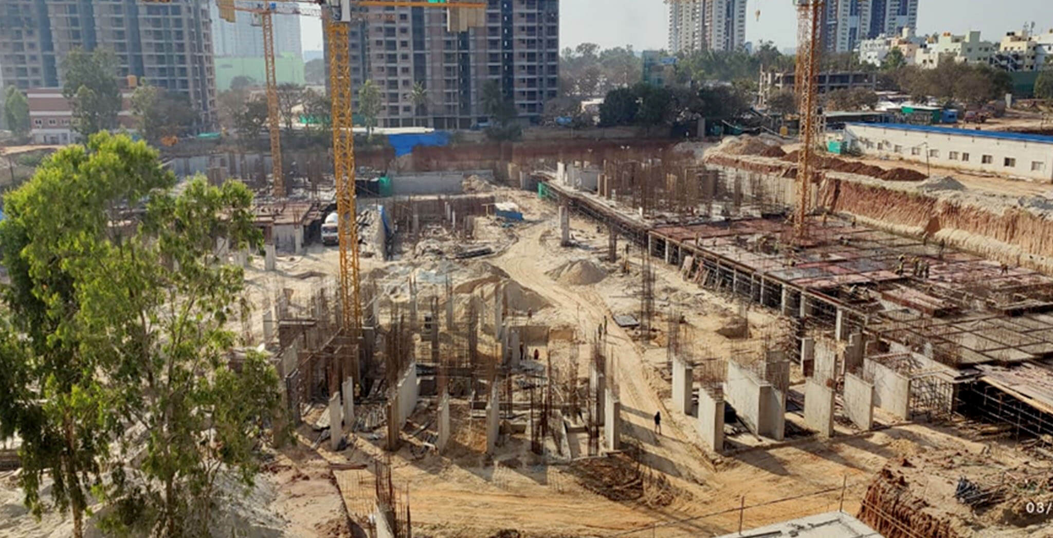 Feb 2021 - Tranquil: Footings for towers P & O are in progress; Footings in towers Q, K, L, M, and N are completed, UB slab in towers Q,L & M are in progress; UB slab in tower K completed