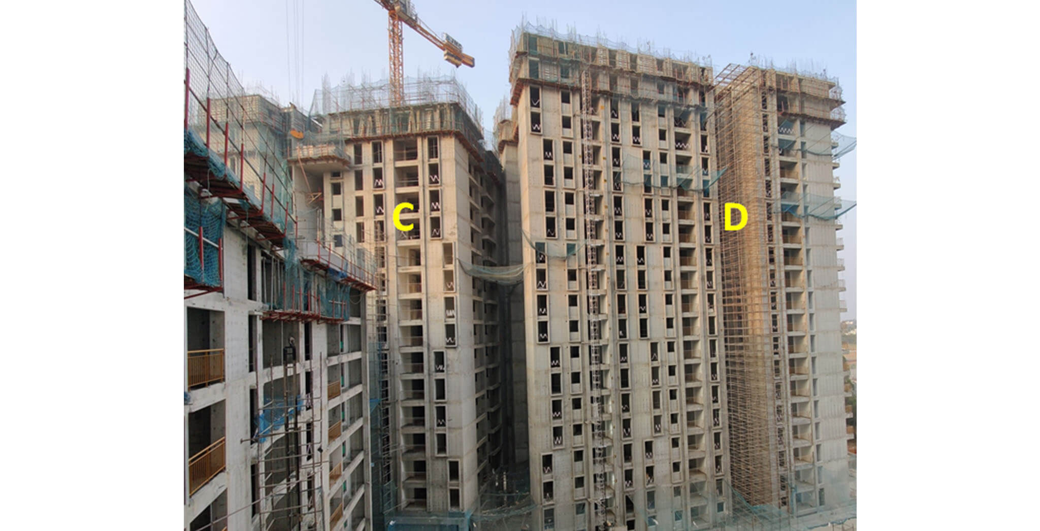 Feb 2021 - Serene: Tower C—17th floor slab completed; Tower D—20th floor slab structure work-in-progress
