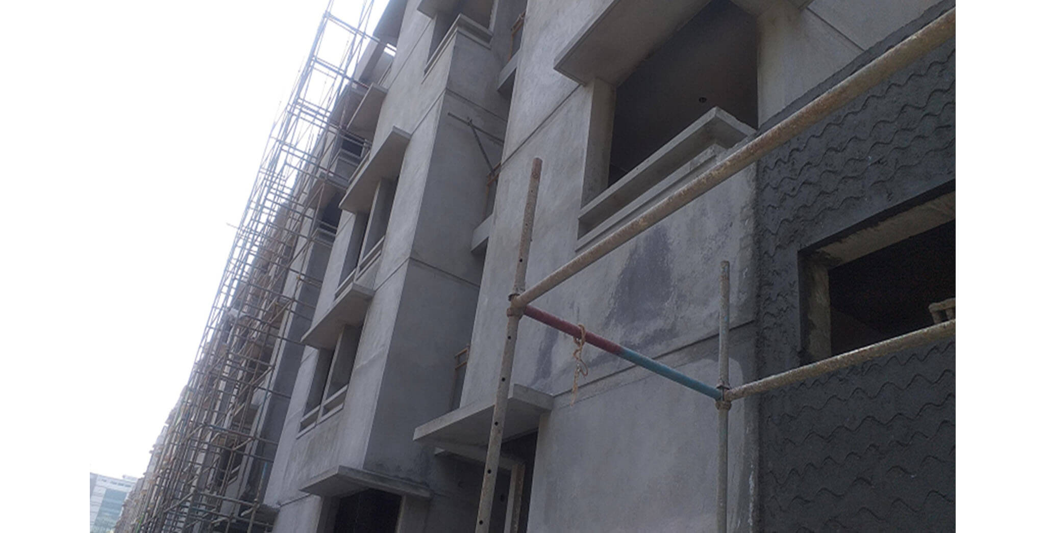 Feb 2021 - Towards North side view: N Block—52 & 53 series flat external plastering work completed