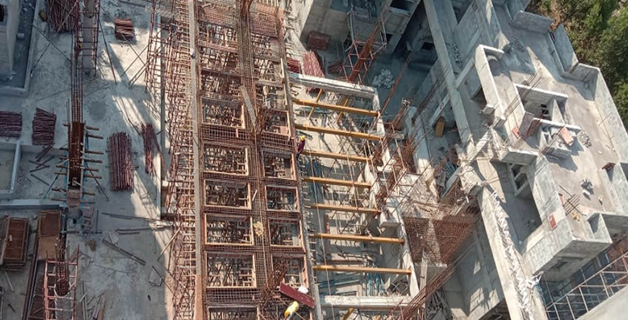 Feb 2021 - Podium side view: S Block—Indoor games room shuttering work-in-progress at 2nd floor level