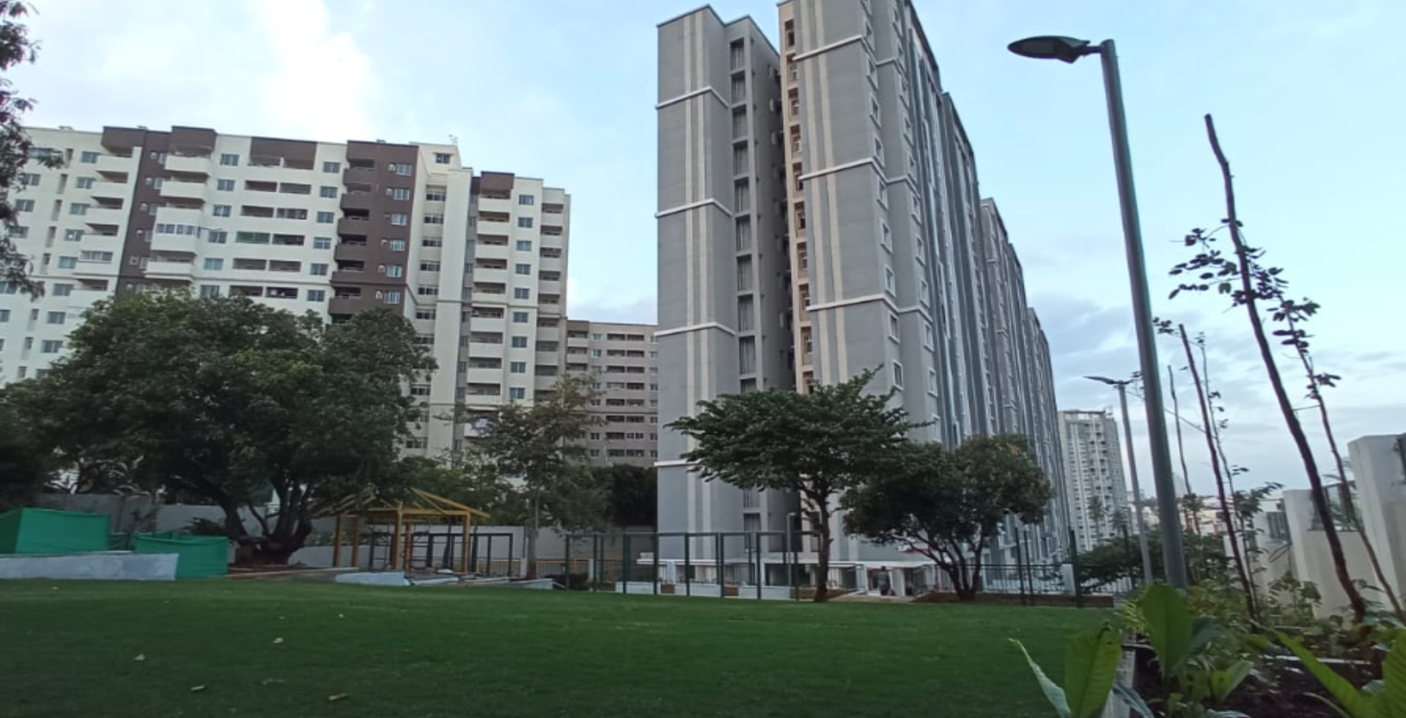 Dec 2021 - 7Gardens: External development on south side of EFG Towers and view of EFG Towers