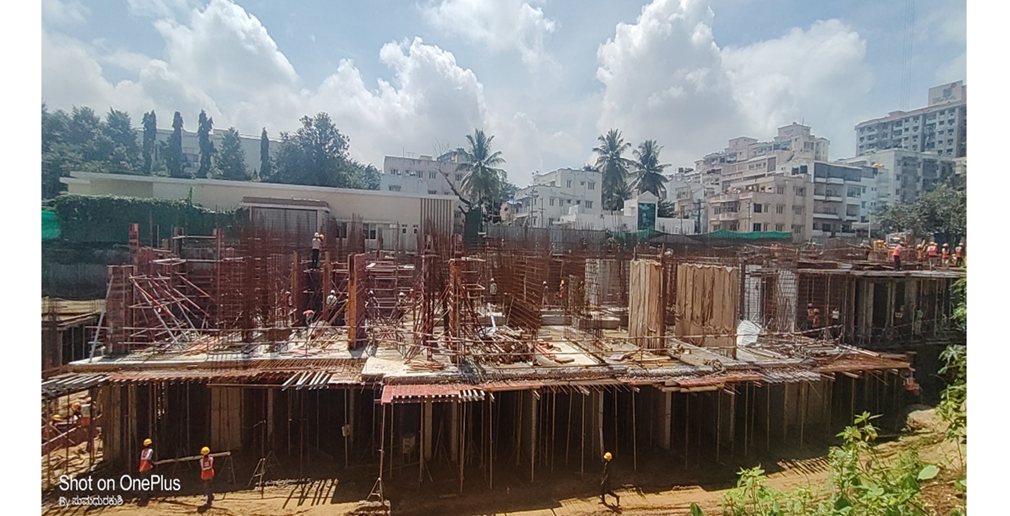 Aug 2022 - Tower B (view from west side): Upper basement slab concreting completed & Ground floor works are in progress