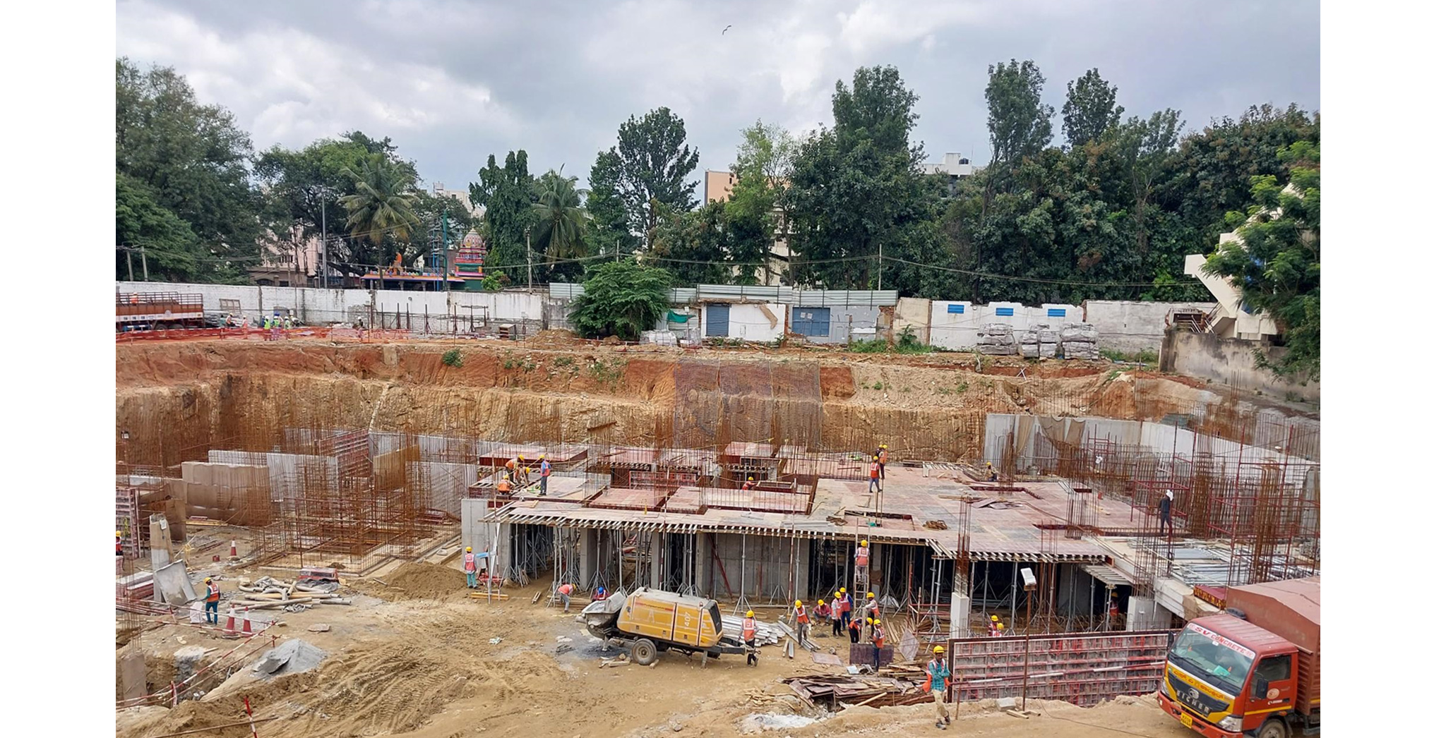 Oct 2022 - Brigade Nanda Heights Tower A (view from North side): Basement raft concreting completed & Upper basement slab works are in progress