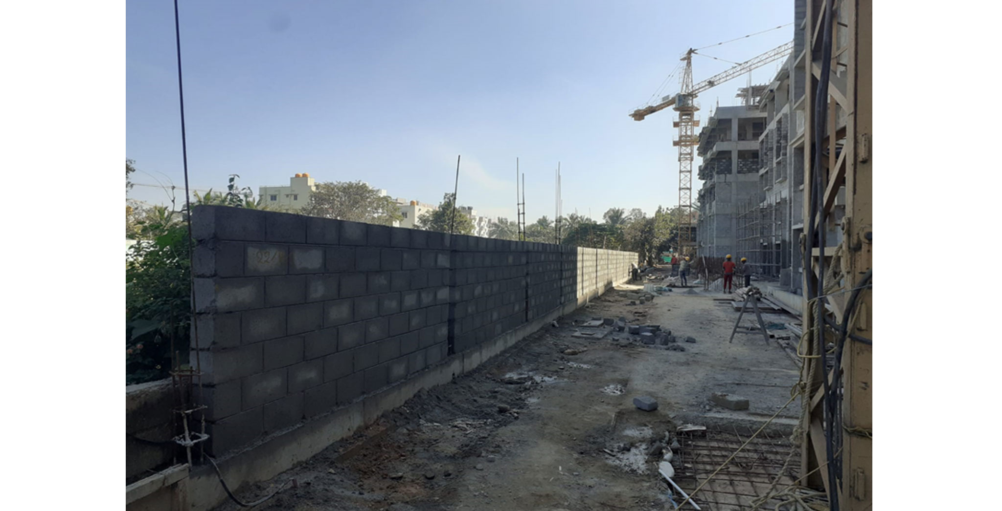 Dec 2022 - Block D: S side compound wall masonry work WIP