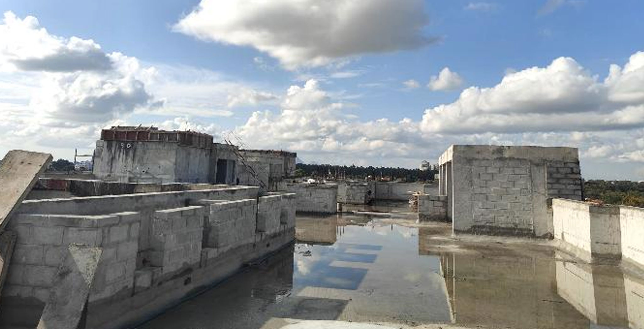 Aug 2025 - Brigade Orchards Fairmont Towers 1 & 2: Terrace activities WIP. Waterproofing work in progress. Structural activities above terrace completed