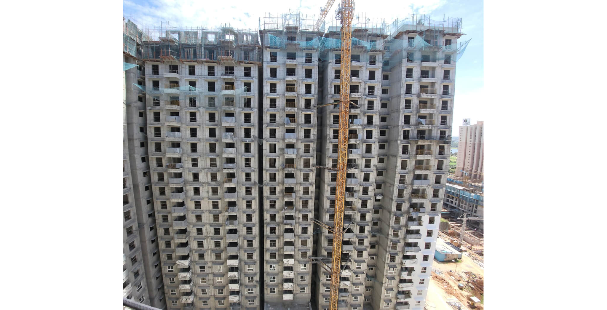  Wing C - Terrace slab completed for part of the slab Parapet wall work in progress. - Status Images 2