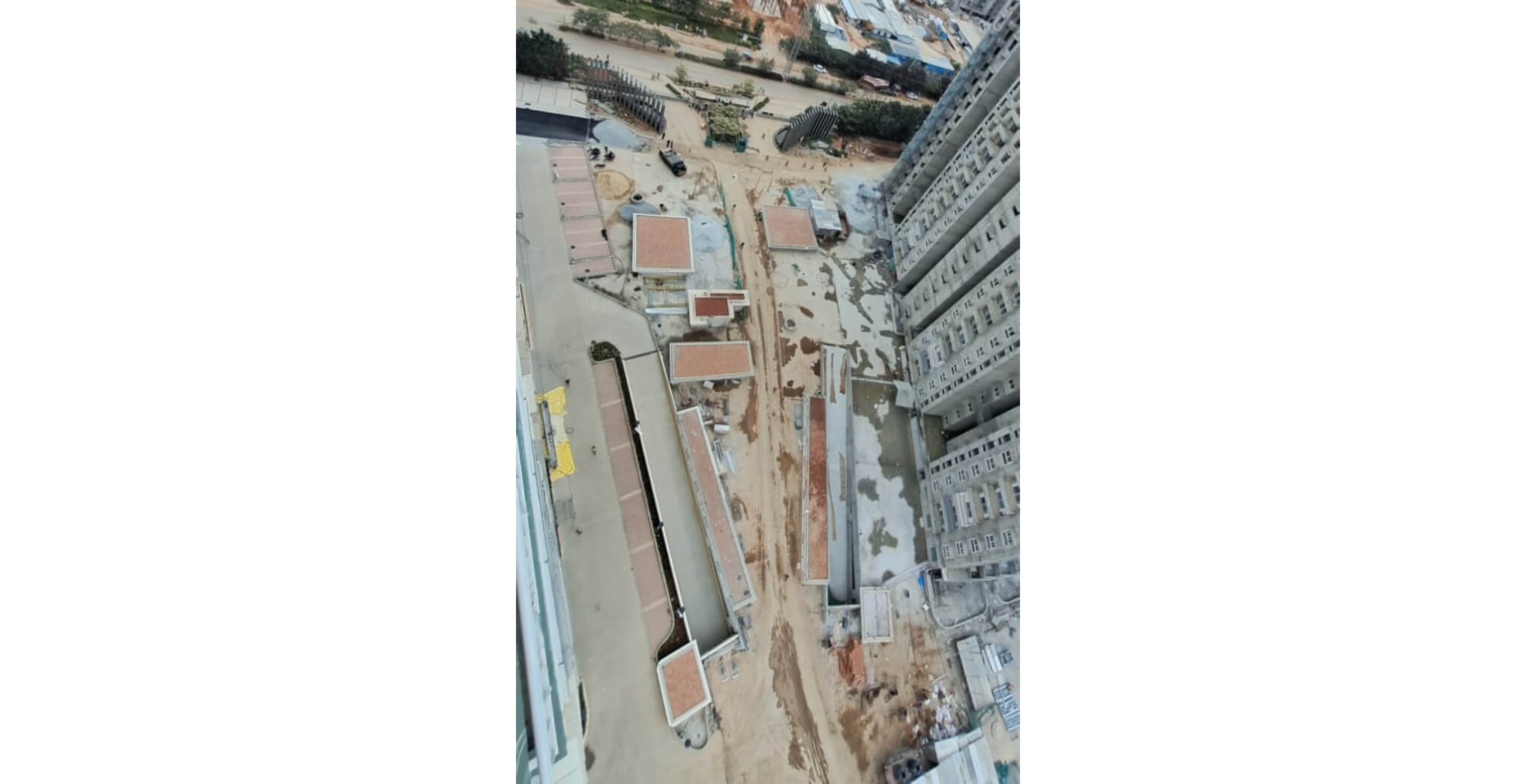  Between L and A tower podium finishing work in progress  - Status Images 16