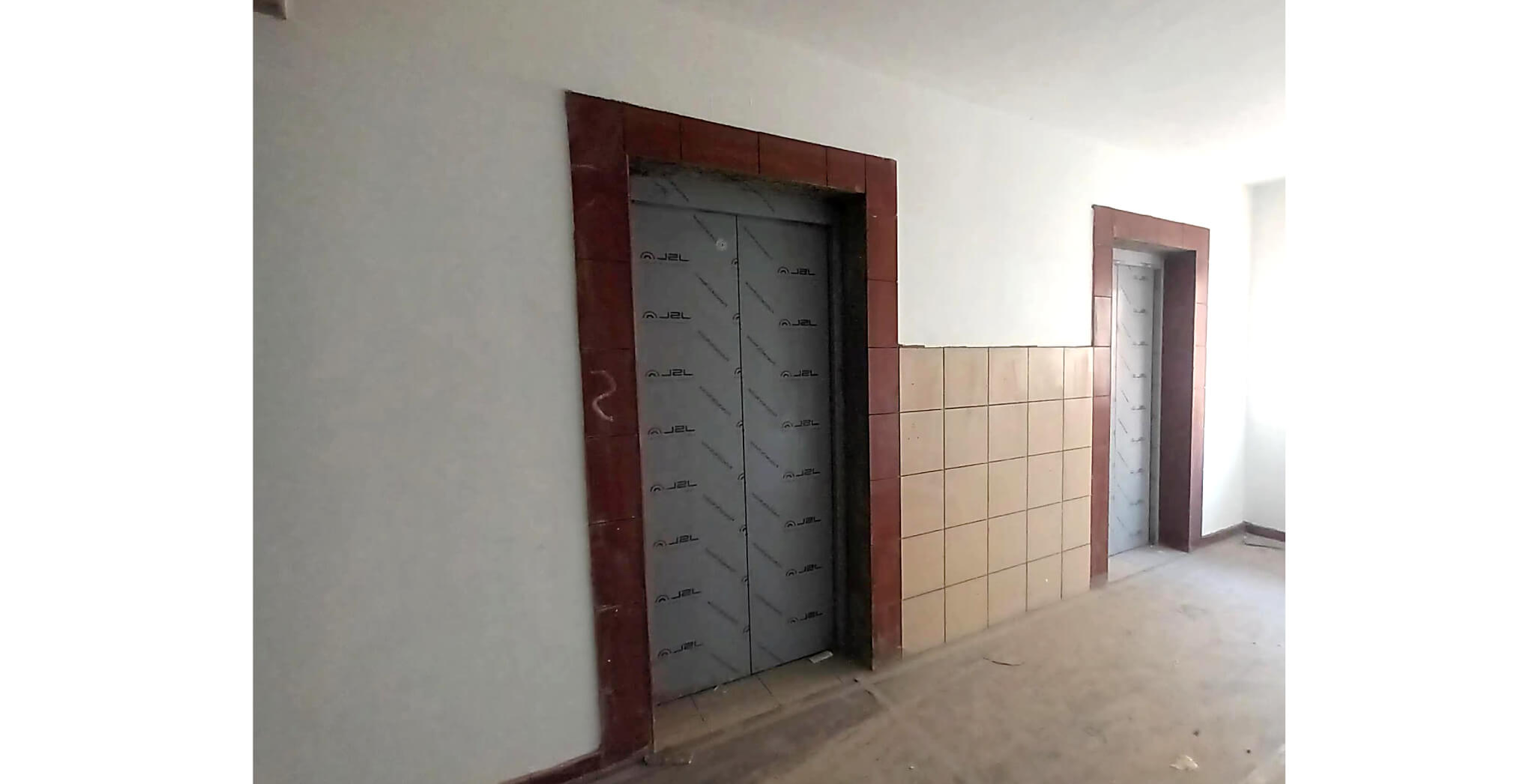  Lift Tiling work Completed Corridor Area Painting work in progress - Status Images 7