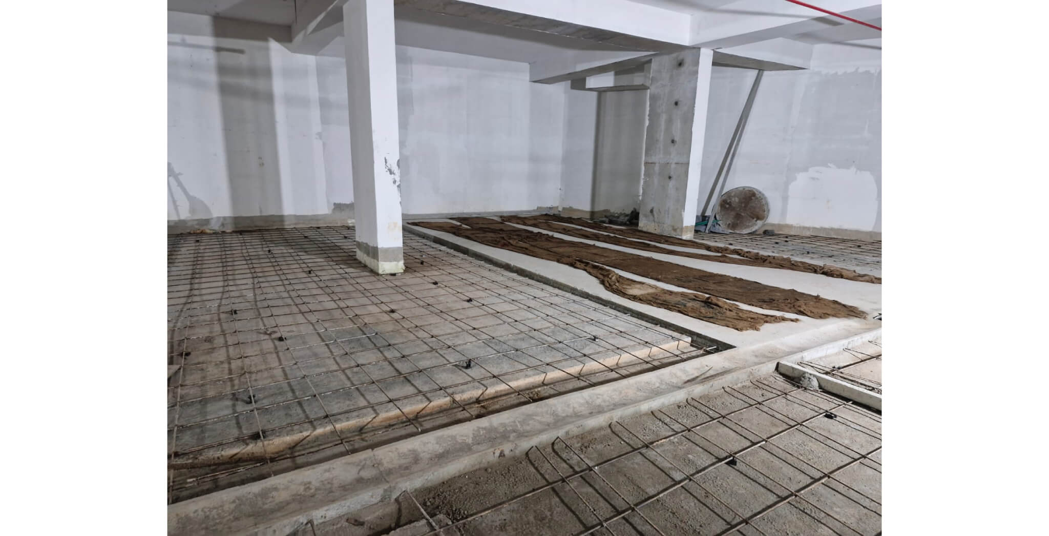  Lower basement flooring work in progress - Status Images 8