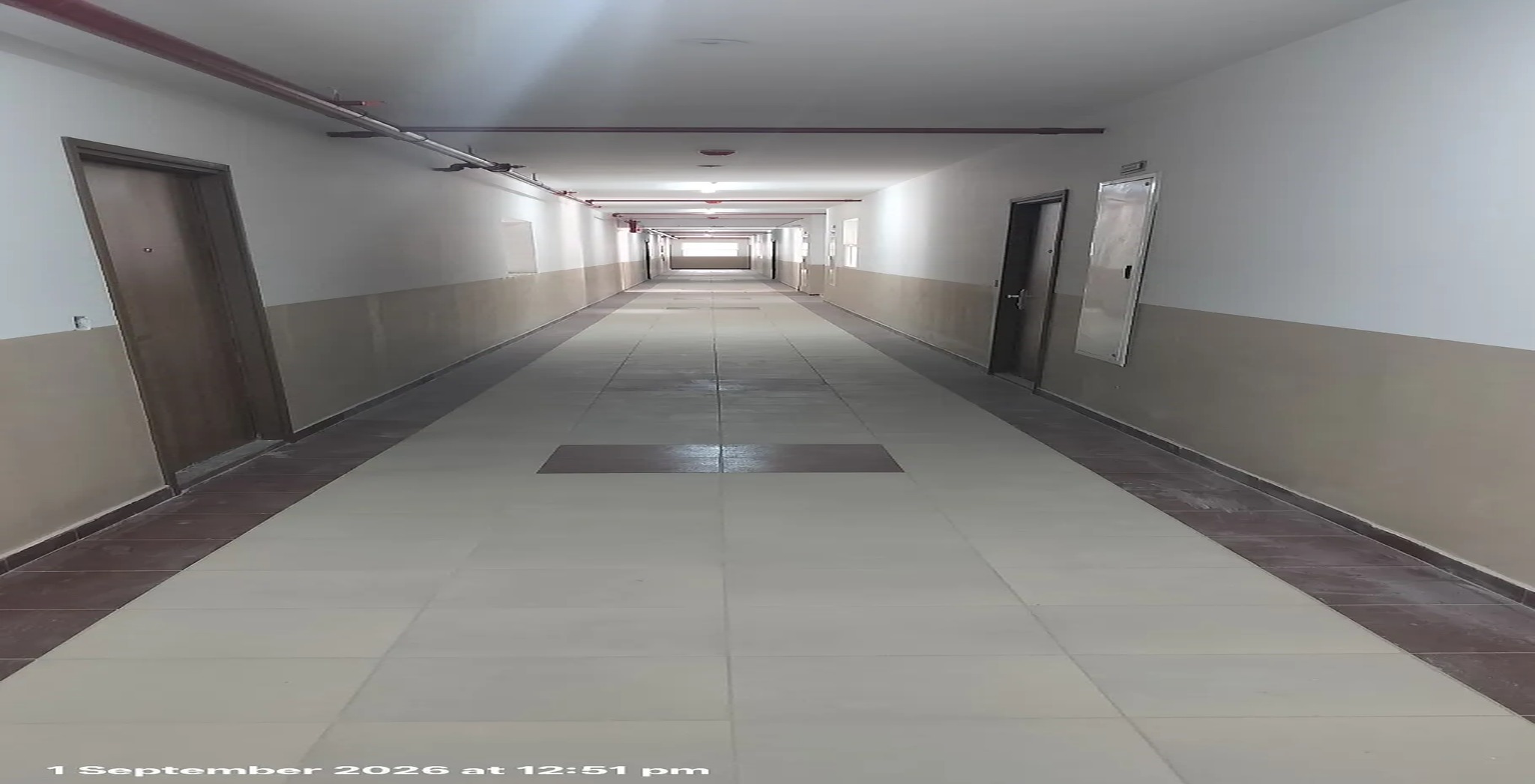 Corridor Tiling work completed - Status Images 2